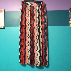 Multi color polyester skirt with a slit to the top
